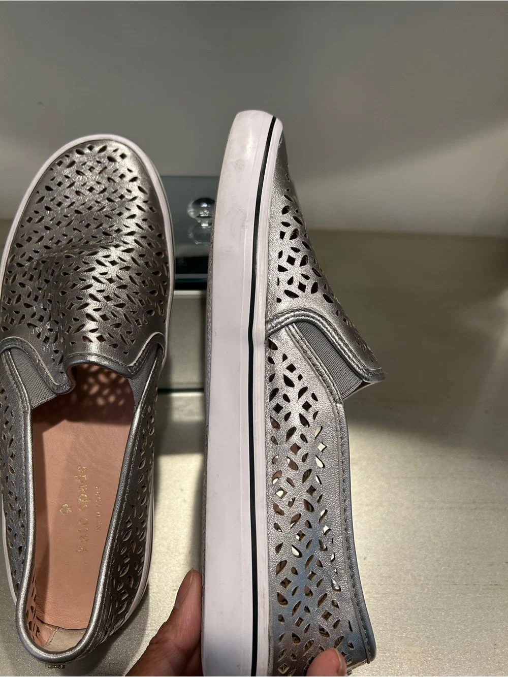 kate spade silver perforated leather slip-on sneakers